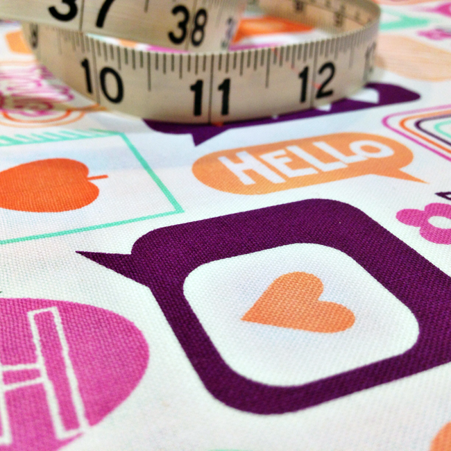 Yippy BeBe NJ fabric store Free Spirit Moxie Chatterbox in Tangerine by Eric McMorris - 1 yard - close up